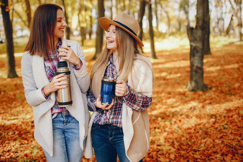 beautiful-girls-have-fun-autumn-park.webp